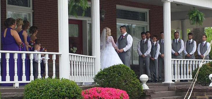wedding ceremony on mansion porch